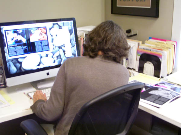 Jeani entering corrections onto 
computer